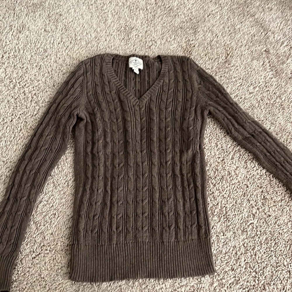 Brown sweater.